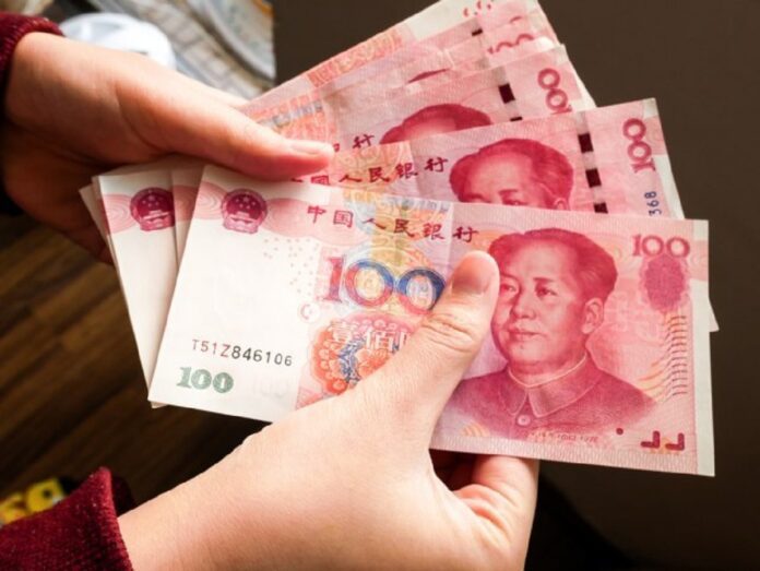 Chinese Yuan Strengthens to 7.0933 Against Dollar