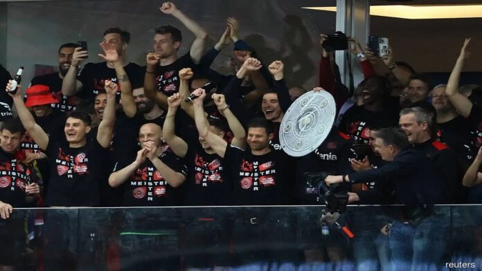 Unbeaten Bayer Leverkusen win maiden Bundesliga
